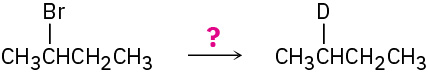 The reaction of 2-bromobutane with an unknown reagent represented by a question mark to form a product in which Br is replaced by D.