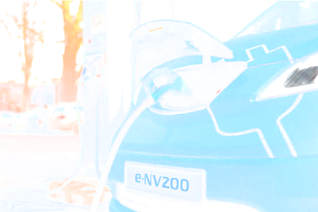 An electric car gets recharged. (credit: “Nissan e-NV200 electric car” by Kārlis Dambrāns, flickr).
