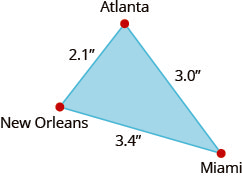 The figure is a triangle formed by New Orleans, Atlanta, and Miami. The distance between New Orleans and Atlanta is 2.1 inches. The distance between Atlanta and Miami is 3 inches. The distance between Miami and New Orleans is 3.4 inches.